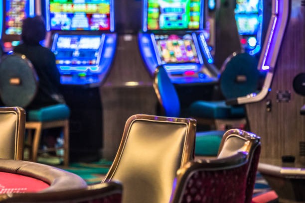 baccarat card table with croupier dealing